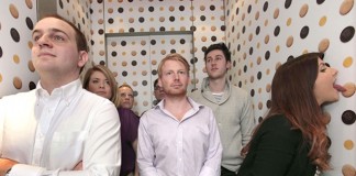 Elevator with lickable wallpaper