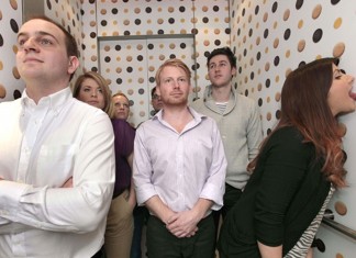 Elevator with lickable wallpaper